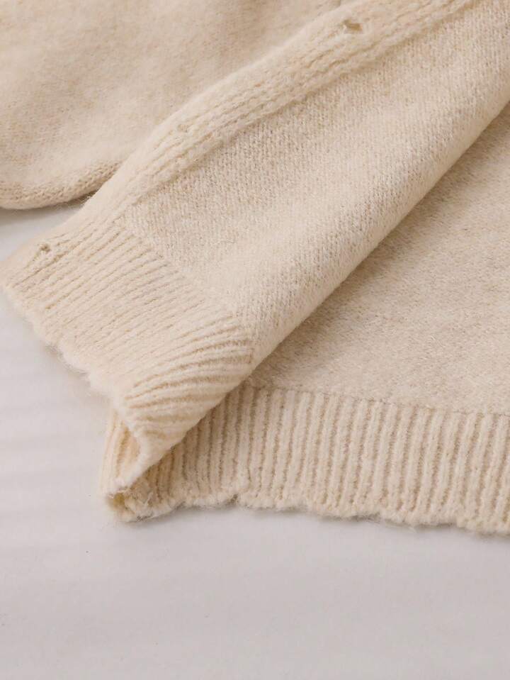 cardigan maille nude à grand col dentelle guipure et nœuds vichy rouge