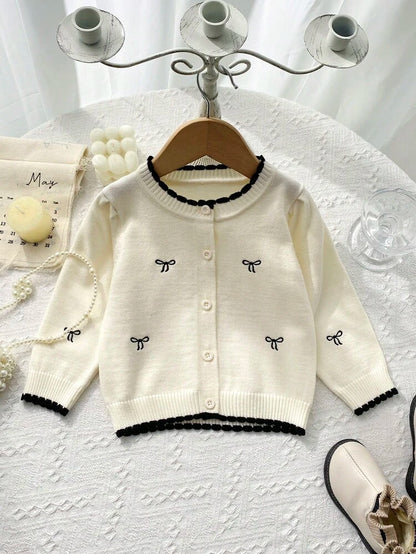 Cardigan Chic "Élégance Romantique" – Blanc Cassé & Nœuds Noirs