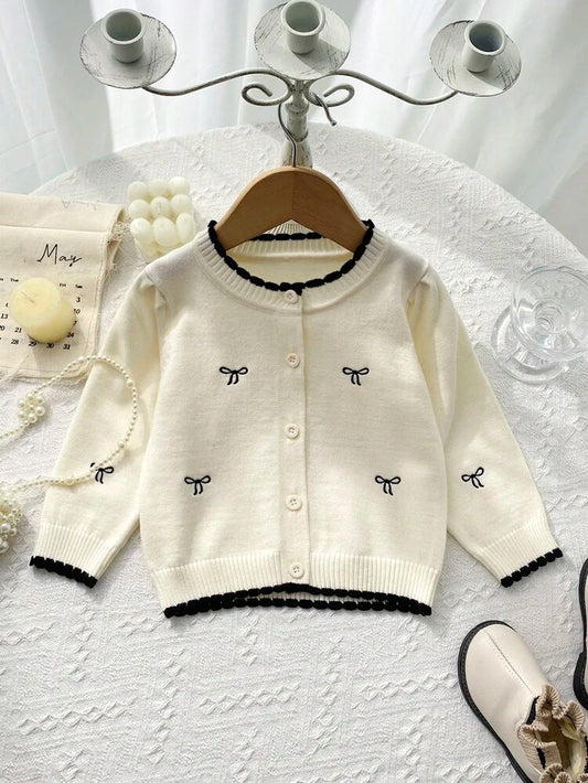 Cardigan Chic "Élégance Romantique" – Blanc Cassé & Nœuds Noirs