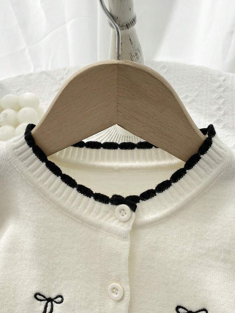 Cardigan Chic "Élégance Romantique" – Blanc Cassé & Nœuds Noirs