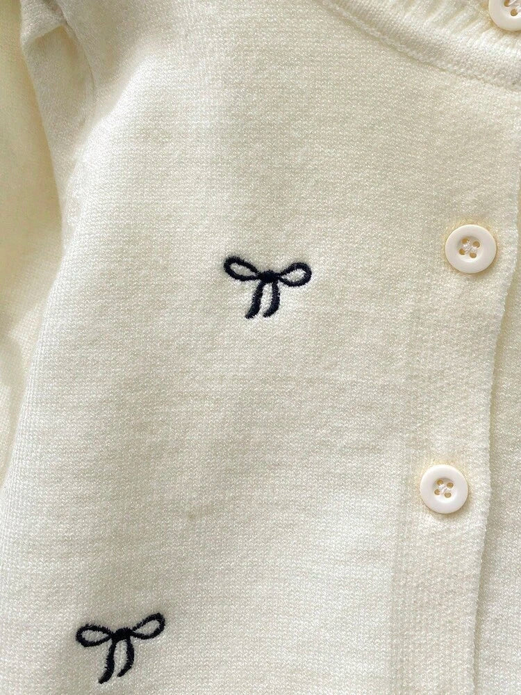 Cardigan Chic "Élégance Romantique" – Blanc Cassé & Nœuds Noirs