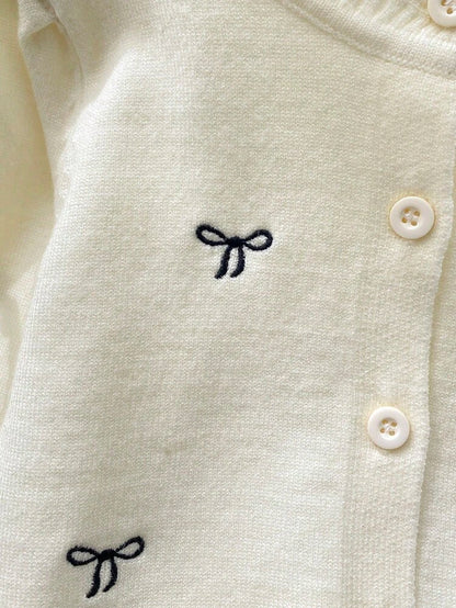 Cardigan Chic "Élégance Romantique" – Blanc Cassé & Nœuds Noirs