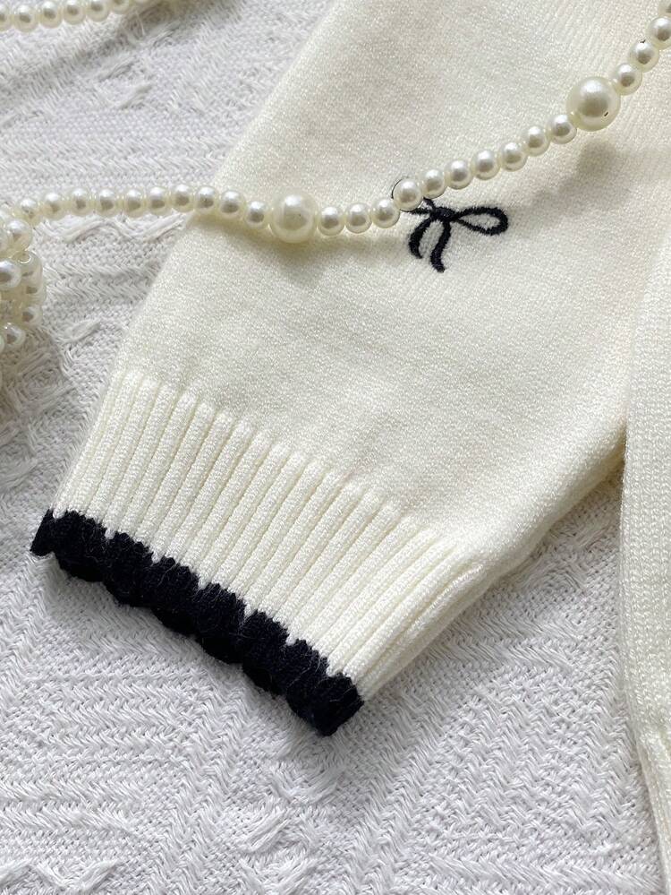 Cardigan Chic "Élégance Romantique" – Blanc Cassé & Nœuds Noirs